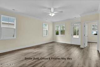 empty room with ceiling fan and dark hardwood / wood-style flooring