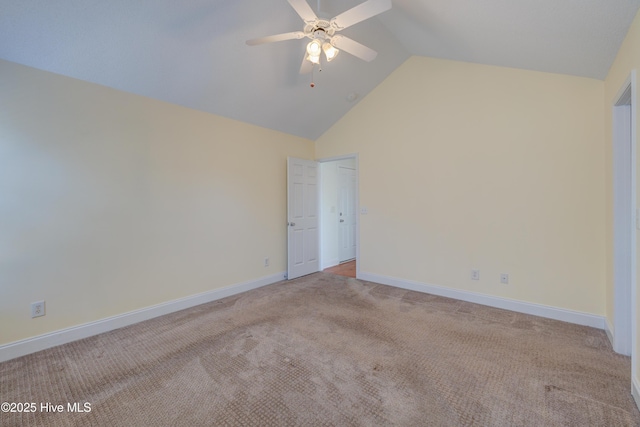 unfurnished bedroom featuring light carpet, high vaulted ceiling, ceiling fan, and baseboards