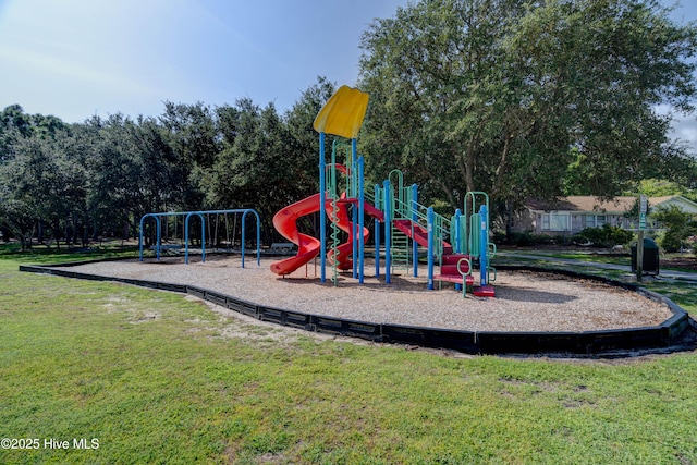 community play area featuring a lawn