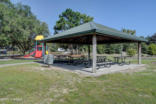 view of home's community featuring playground community, a lawn, and a gazebo