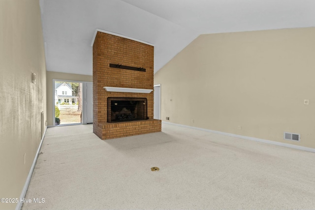 unfurnished living room with baseboards, a fireplace, visible vents, and light colored carpet