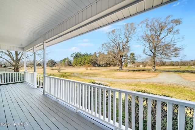 deck featuring a lawn