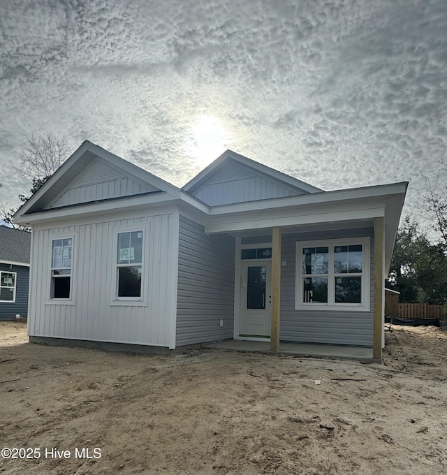 ranch-style home with board and batten siding