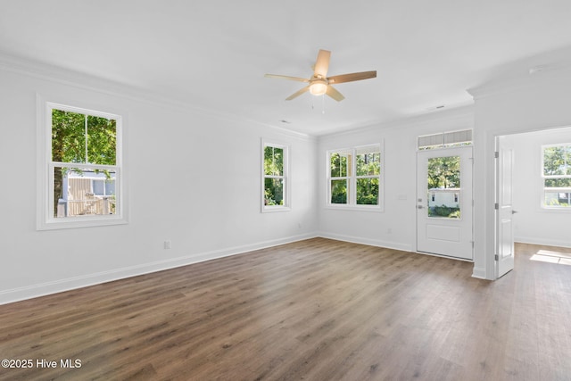 211 NE 78th St, Oak Island, NC 28465 - unfurnished room featuring ornamental molding, a ceiling fan, wood finished floors, and baseboards