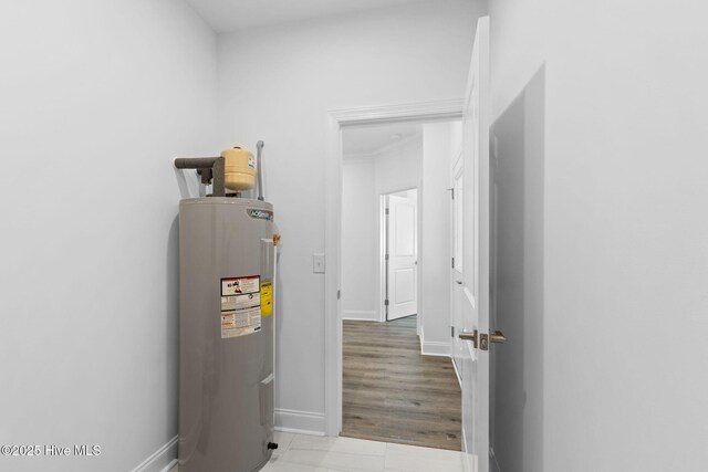 211 NE 78th St, Oak Island, NC 28465 - utility room with electric water heater