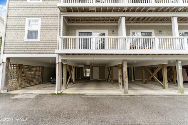 exterior space with a carport