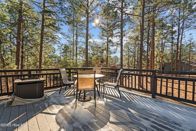 deck with outdoor dining space