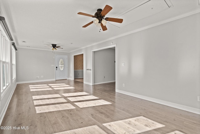 unfurnished living room with light hardwood / wood-style flooring, ceiling fan, and ornamental molding