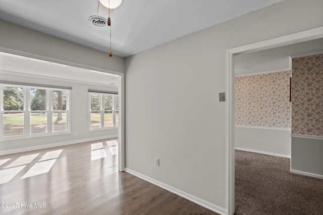 empty room featuring hardwood / wood-style floors