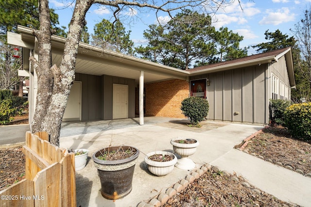 rear view of house with a carport