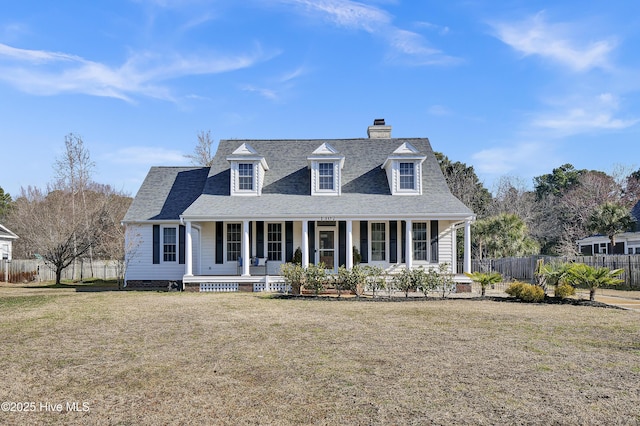 cape cod-style house featuring roof with shingles, crawl space, fence, a front lawn, and a porch