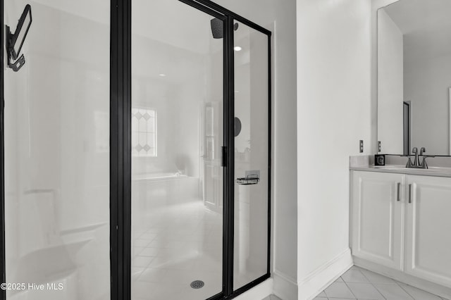 1307 Edgewater Club Rd, Wilmington, NC 28411 - full bath with tile patterned flooring, a shower stall, baseboards, and vanity