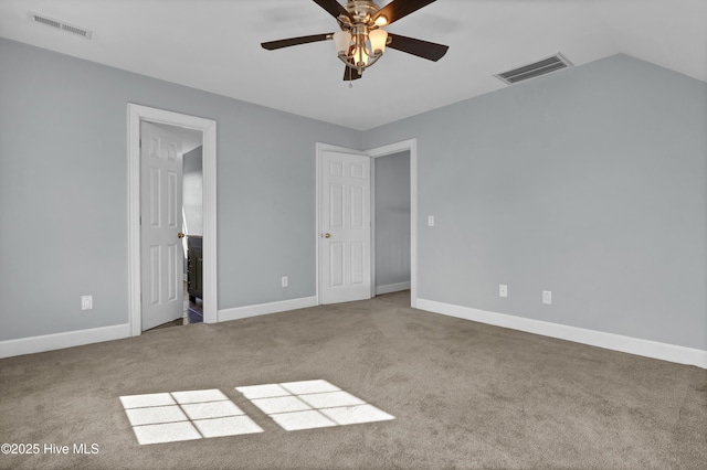 1307 Edgewater Club Rd, Wilmington, NC 28411 - unfurnished bedroom with carpet floors, baseboards, and connected bathroom
