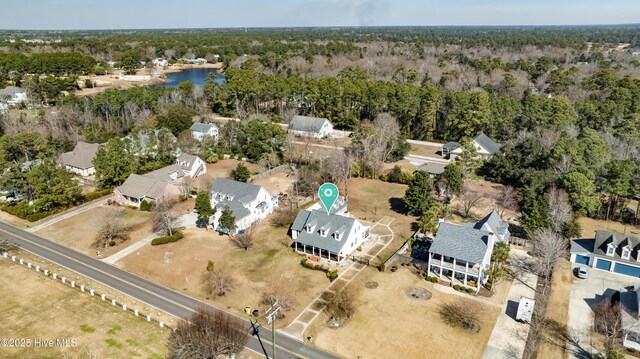 1307 Edgewater Club Rd, Wilmington, NC 28411 - aerial view of residential area with a heavily wooded area and a nearby body of water