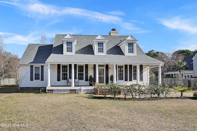 1307 Edgewater Club Rd, Wilmington, NC 28411 - view of front facade featuring covered porch, a chimney, and a shingled roof
