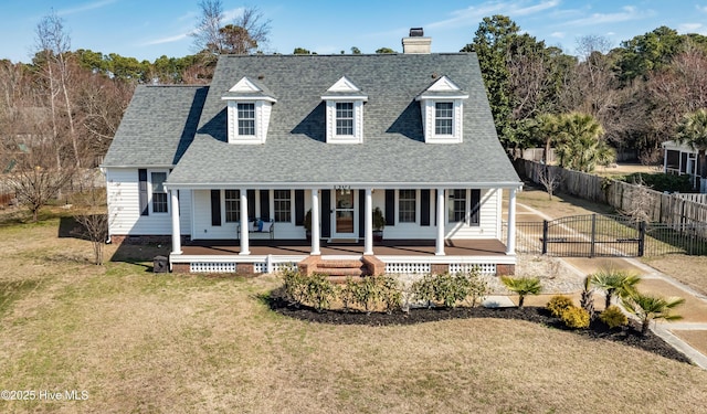1307 Edgewater Club Rd, Wilmington, NC 28411 - view of front of home with a gate, covered porch, a shingled roof, and a chimney