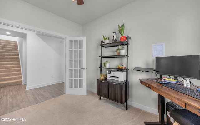 office area featuring ceiling fan, french doors, light carpet, and lofted ceiling