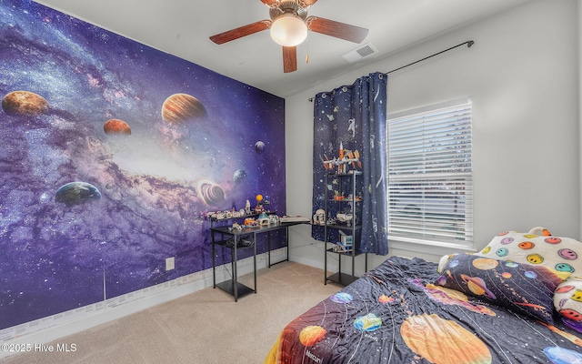 bedroom featuring ceiling fan and carpet flooring