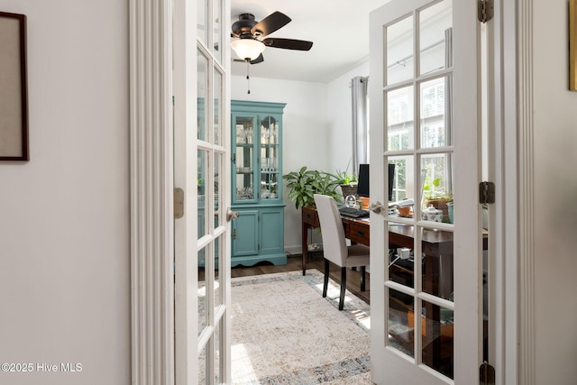 home office featuring ceiling fan and french doors