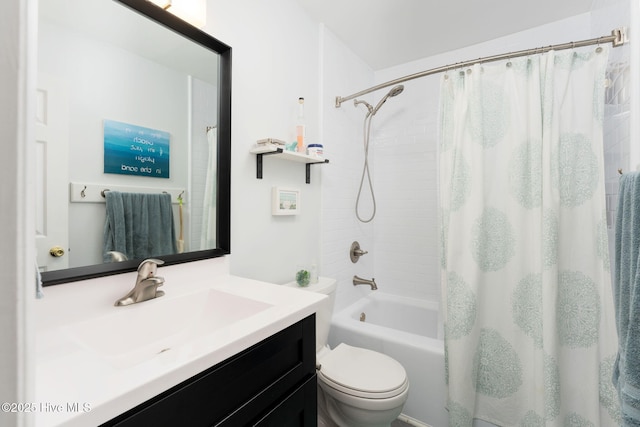 full bathroom with shower / bath combo, vanity, and toilet