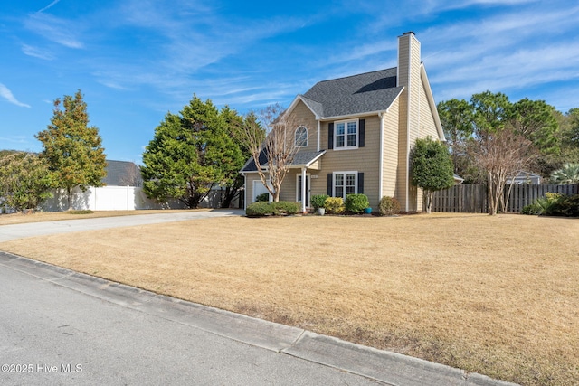 view of front of home with a front yard