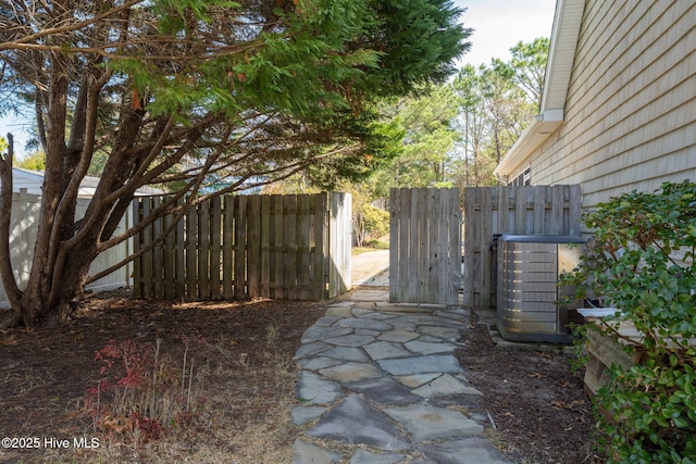 view of yard featuring central AC