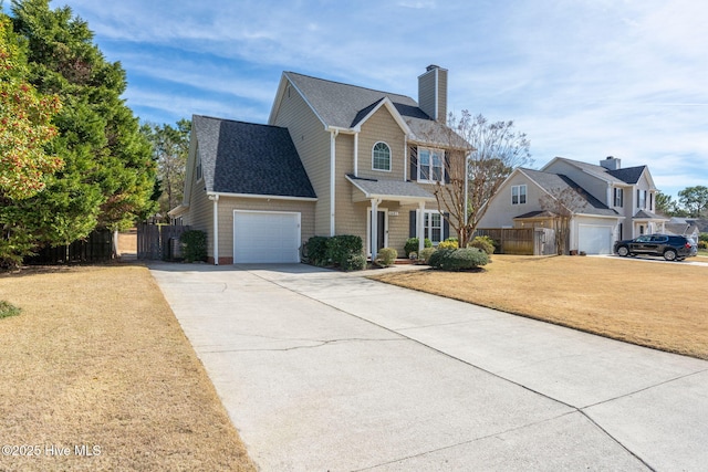 view of front facade with a front lawn and a garage