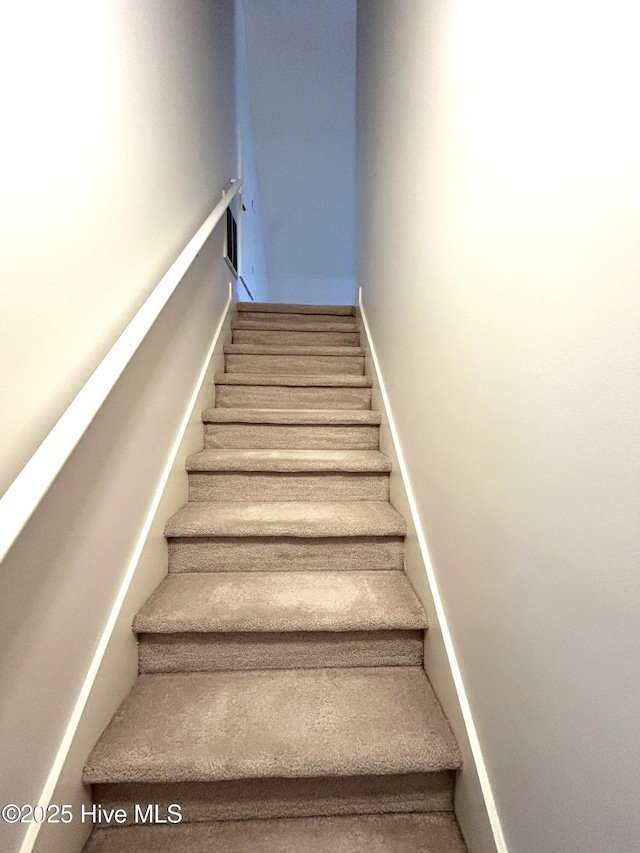 6237 Sentry Oaks Dr, Wilmington, NC 28409 - staircase with baseboards