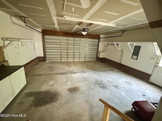 6237 Sentry Oaks Dr, Wilmington, NC 28409 - garage featuring a garage door opener