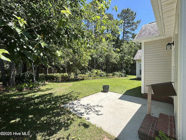 6237 Sentry Oaks Dr, Wilmington, NC 28409 - view of green lawn with a patio