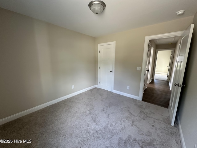 159 Montague Rd, Currie, NC 28435 - unfurnished bedroom with carpet floors and attic access