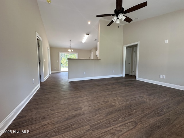 159 Montague Rd, Currie, NC 28435 - unfurnished living room with a ceiling fan, dark wood finished floors, a chandelier, and high vaulted ceiling