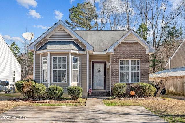 view of front of property featuring brick siding