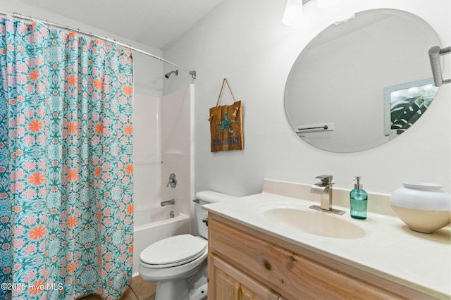 bathroom featuring shower / bath combination with curtain, tile patterned flooring, vanity, and toilet