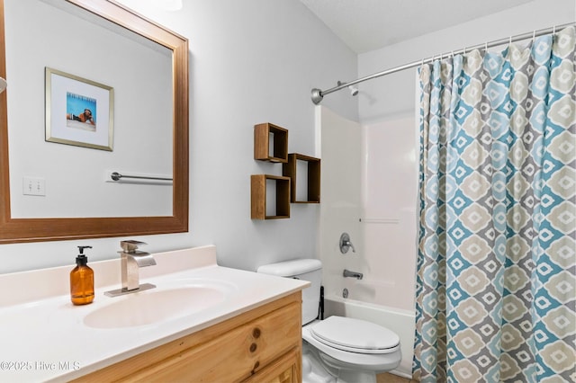 bathroom with toilet, vanity, and shower / tub combo with curtain