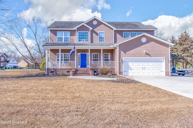 view of front of property with covered porch, a front yard, and a garage