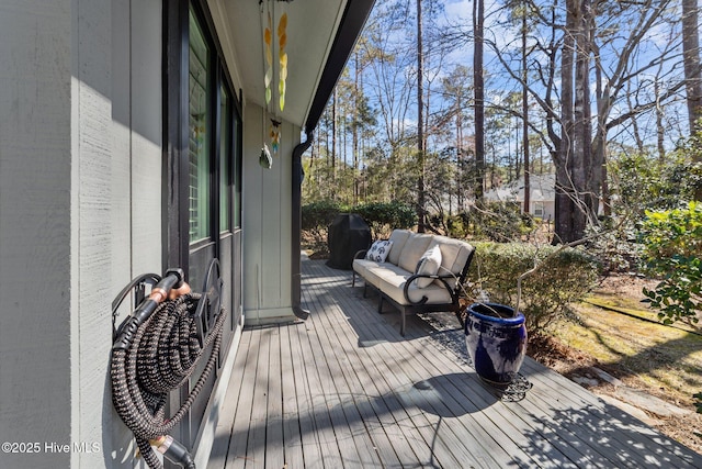 deck featuring an outdoor living space