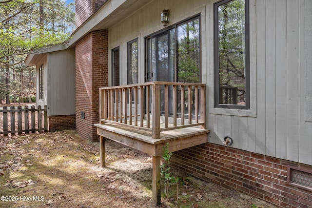 wooden deck featuring fence