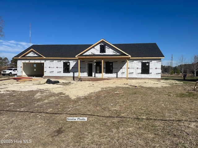 unfinished property featuring a porch