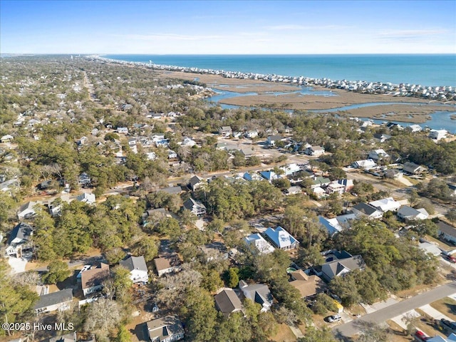 bird's eye view featuring a water view and a residential view