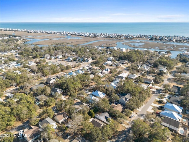 drone / aerial view with a residential view and a water view