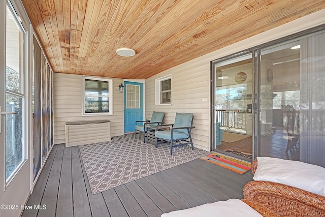 sunroom / solarium with wooden ceiling