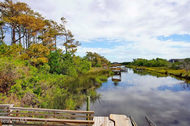 water view featuring a dock