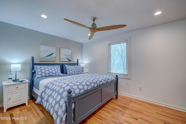 bedroom featuring light wood-type flooring, ceiling fan, baseboards, and recessed lighting