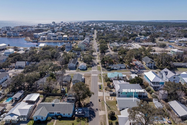 aerial view featuring a water view and a residential view