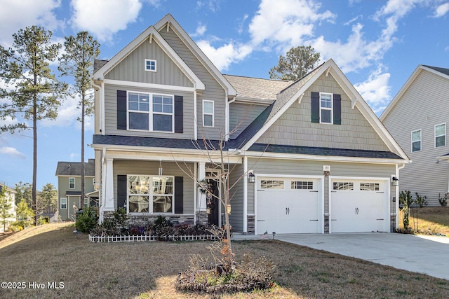 craftsman-style house with covered porch and a garage