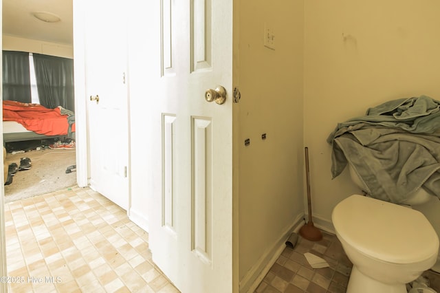 bathroom featuring baseboards