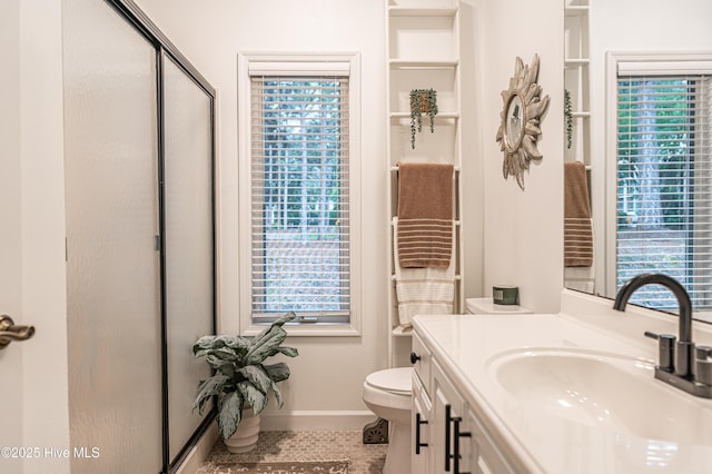 full bathroom featuring healthy amount of natural light, a shower stall, and tile patterned flooring