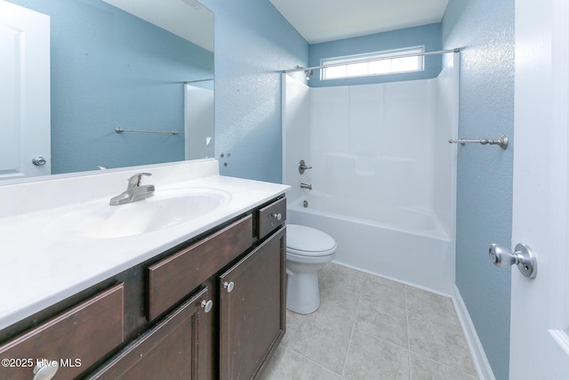 full bathroom featuring a textured wall, toilet, vanity,  shower combination, and tile patterned floors