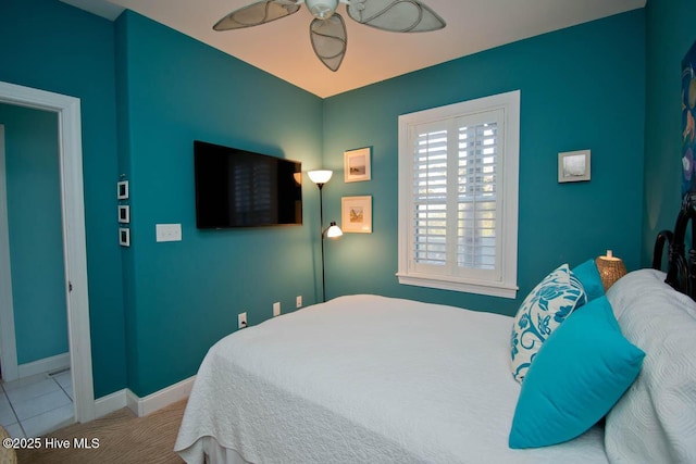 bedroom featuring baseboards